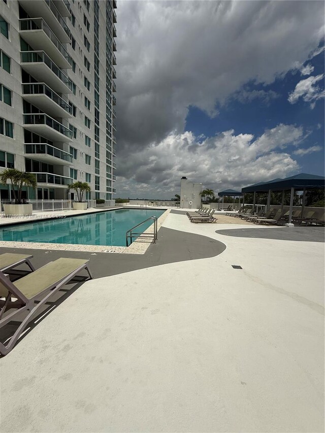 1861 NW S River Dr Unit 1602, Miami, FL 33125 - community pool featuring a patio