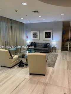 1861 NW S River Dr Unit 1602, Miami, FL 33125 - living room with wood finished floors and recessed lighting
