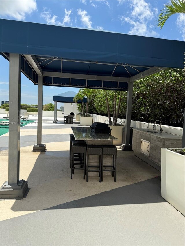 1861 NW S River Dr Unit 1602, Miami, FL 33125 - view of patio / terrace featuring a gazebo, area for grilling, and a sink