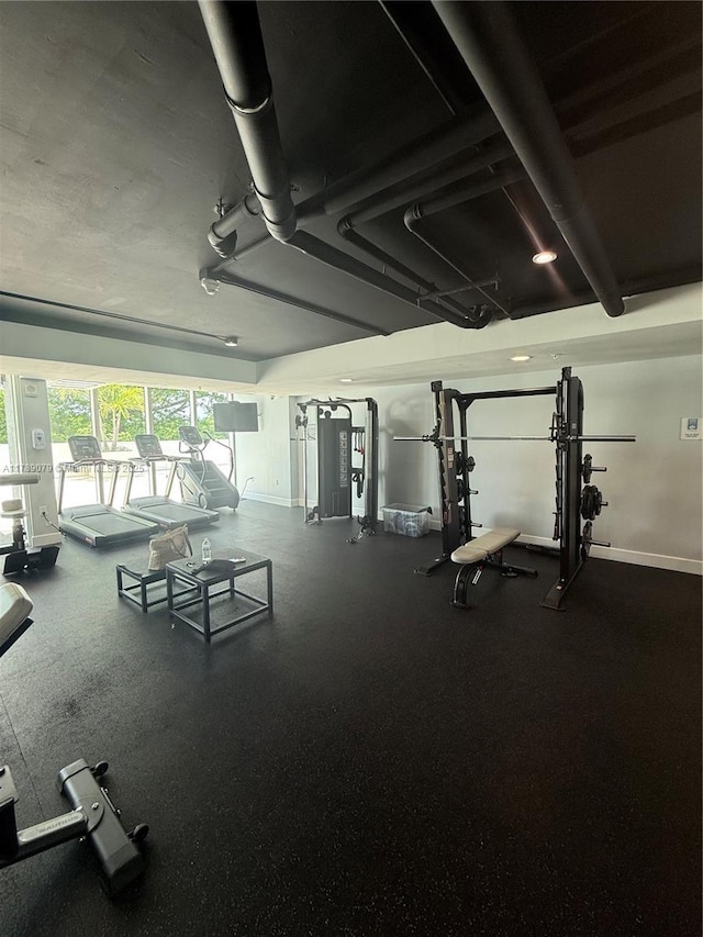 1861 NW S River Dr Unit 1602, Miami, FL 33125 - workout area featuring baseboards