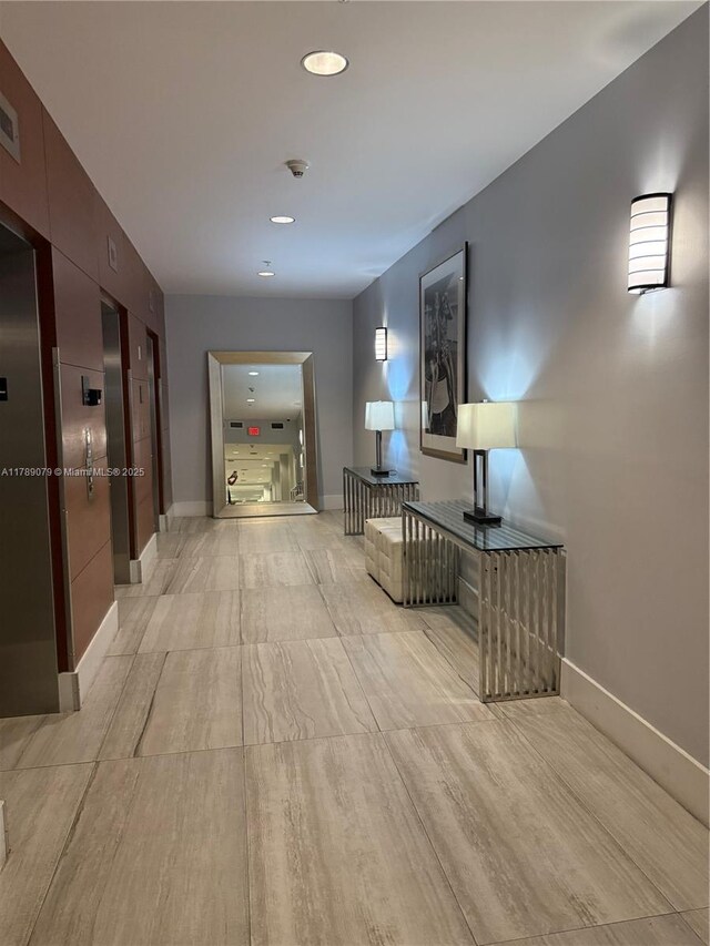 1861 NW S River Dr Unit 1602, Miami, FL 33125 - corridor featuring baseboards and recessed lighting