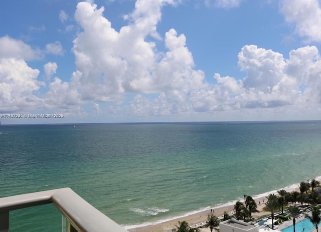 property view of water featuring a beach view