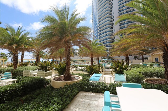 view of property's community with outdoor dining space