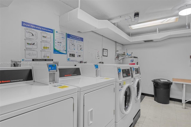 4400 Hillcrest Dr Unit 912B, Hollywood, FL 33021 - community laundry room featuring light tile patterned flooring, independent washer and dryer, and visible vents