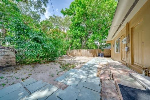 exterior space featuring fence private yard