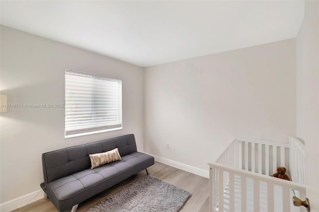 14214 SW 177th Ter, Miami, FL 33177 - bedroom featuring baseboards and light wood finished floors