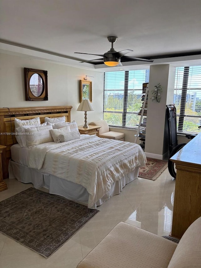 500 Three Islands Blvd Unit 313, Hallandale Beach, FL 33009 - bedroom with light tile patterned floors, ceiling fan, and baseboards