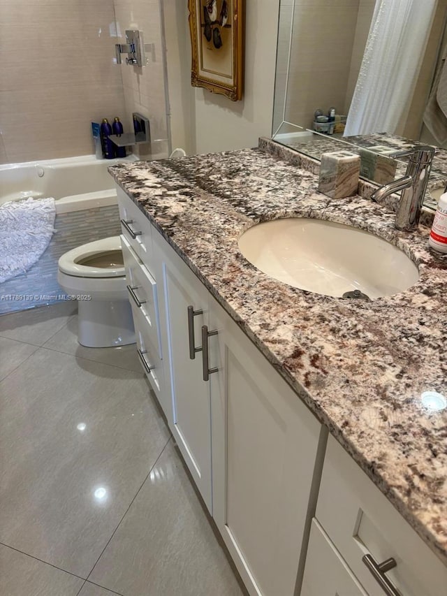 500 Three Islands Blvd Unit 313, Hallandale Beach, FL 33009 - full bathroom featuring tile patterned floors, toilet, and vanity
