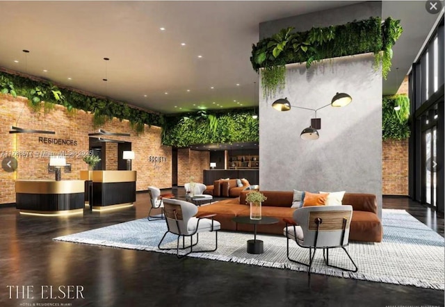 398 NE 5th St Unit 2805, Miami, FL 33132 - building lobby with brick wall, a high ceiling, and recessed lighting