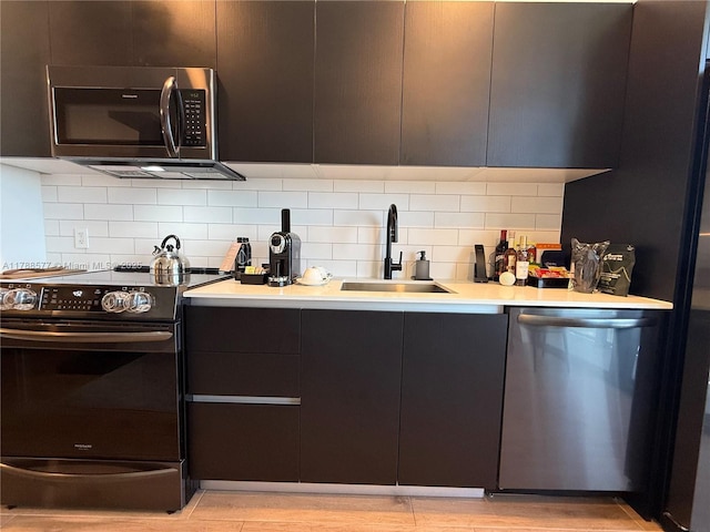 398 NE 5th St Unit 2805, Miami, FL 33132 - kitchen with stainless steel appliances, a sink, and modern cabinets