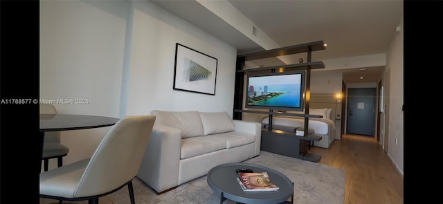 398 NE 5th St Unit 2805, Miami, FL 33132 - living room with wood finished floors and baseboards