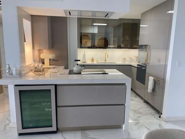 1450 Brickell Bay Dr Unit 1709, Miami, FL 33131 - interior space featuring modern cabinets, gray cabinets, and wine cooler