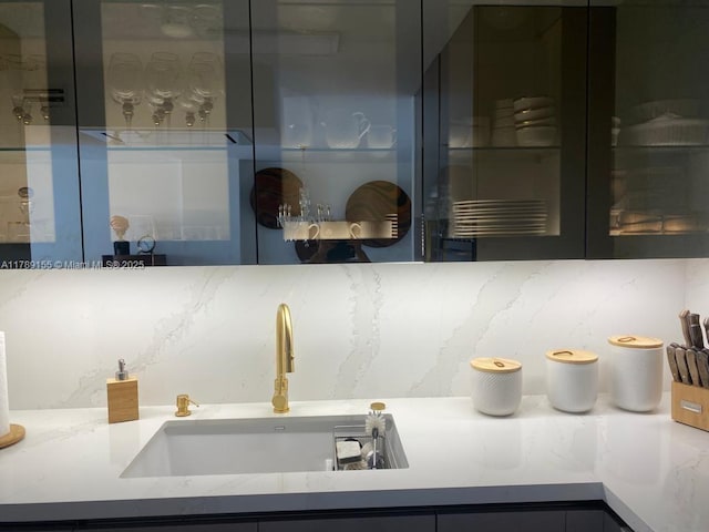 1450 Brickell Bay Dr Unit 1709, Miami, FL 33131 - kitchen with a sink and backsplash