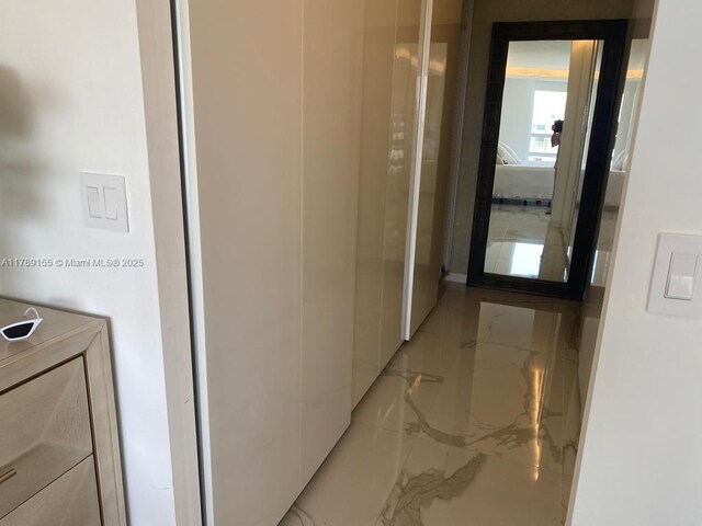 1450 Brickell Bay Dr Unit 1709, Miami, FL 33131 - hall with marble finish floor