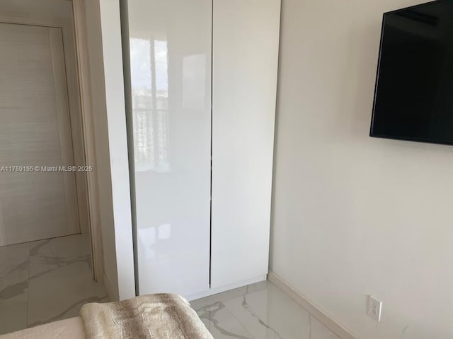 1450 Brickell Bay Dr Unit 1709, Miami, FL 33131 - bathroom with marble finish floor and baseboards