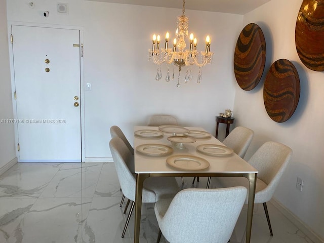 1450 Brickell Bay Dr Unit 1709, Miami, FL 33131 - dining room with marble finish floor, baseboards, and an inviting chandelier