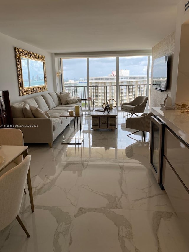 1450 Brickell Bay Dr Unit 1709, Miami, FL 33131 - living room with expansive windows, a wealth of natural light, marble finish floor, and visible vents