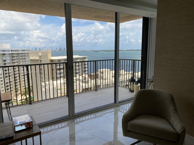 1450 Brickell Bay Dr Unit 1709, Miami, FL 33131 - balcony featuring a city view and a water view