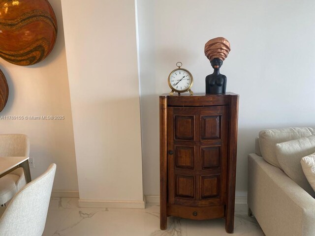 1450 Brickell Bay Dr Unit 1709, Miami, FL 33131 - interior space with baseboards and marble finish floor