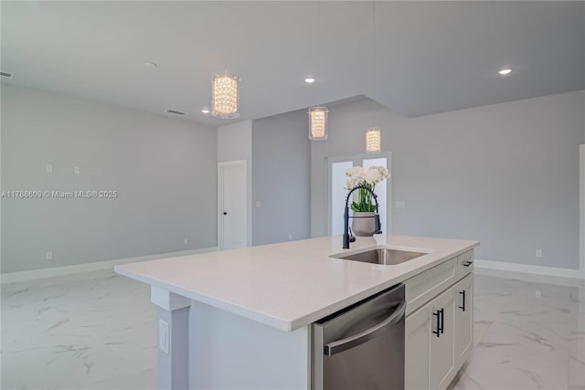 kitchen with recessed lighting, marble finish floor, light countertops, stainless steel dishwasher, and a sink