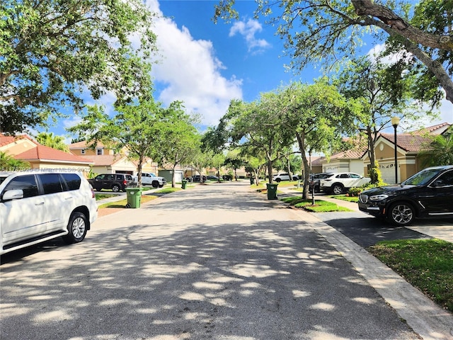 785 Falling Water Rd, Weston, FL 33326 - view of road with a residential view and street lights
