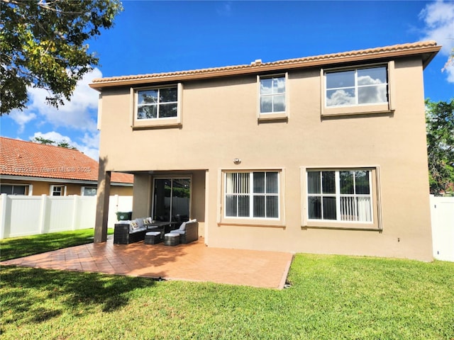 785 Falling Water Rd, Weston, FL 33326 - rear view of house featuring fence, outdoor lounge area, a yard, a patio, and stucco siding