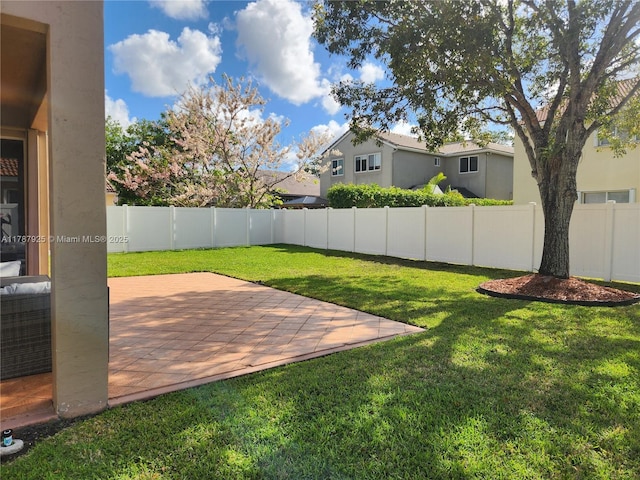 785 Falling Water Rd, Weston, FL 33326 - view of yard with a fenced backyard and a patio area