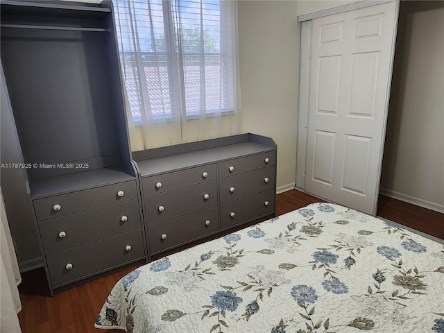 785 Falling Water Rd, Weston, FL 33326 - bedroom with dark wood-type flooring and baseboards