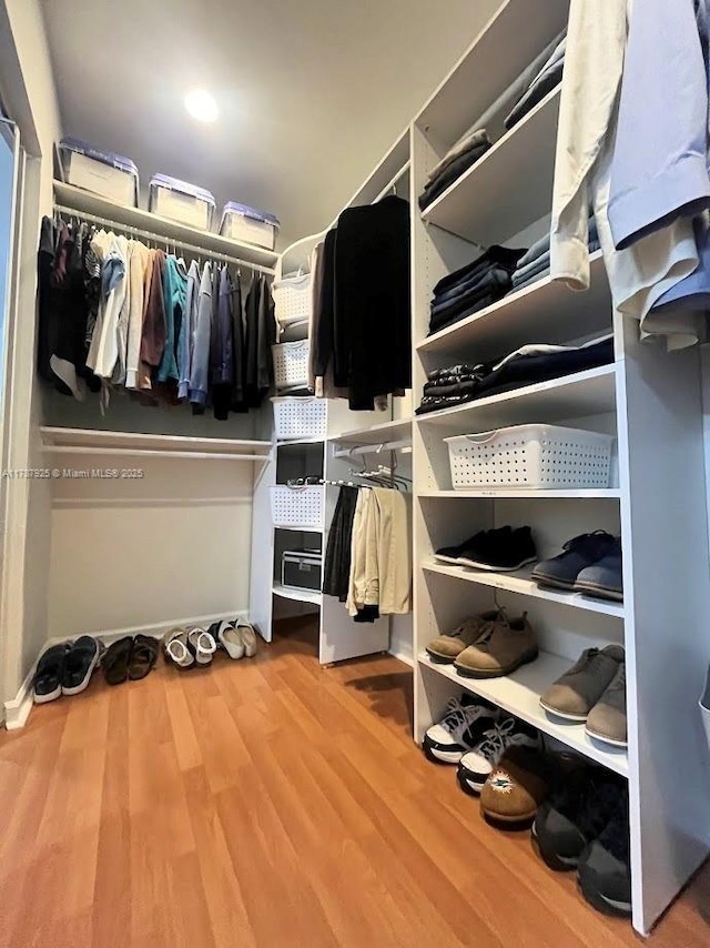 785 Falling Water Rd, Weston, FL 33326 - spacious closet with wood finished floors