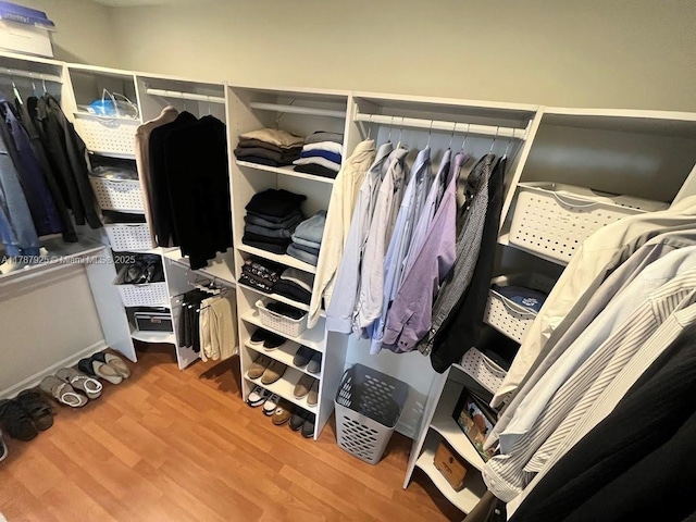 785 Falling Water Rd, Weston, FL 33326 - walk in closet with wood finished floors