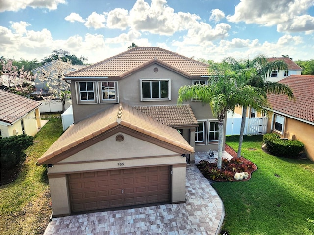 785 Falling Water Rd, Weston, FL 33326 - mediterranean / spanish house featuring fence, a tiled roof, and stucco siding