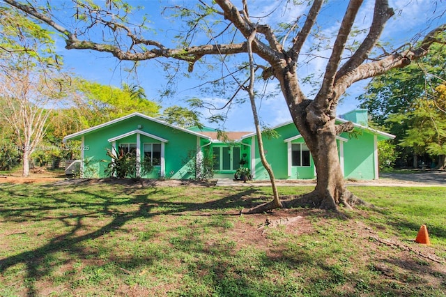 14875 SW 238th St, Homestead, FL 33032 - view of front facade with a front yard