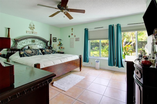 14875 SW 238th St, Homestead, FL 33032 - bedroom featuring multiple windows, light tile patterned floors, and a ceiling fan