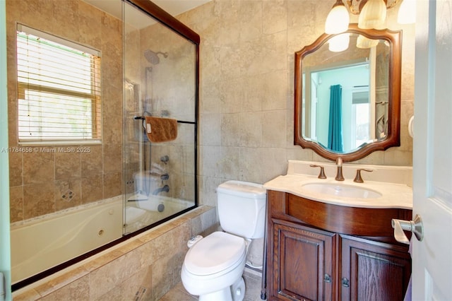 14875 SW 238th St, Homestead, FL 33032 - bathroom with tiled shower / bath, vanity, and tile walls