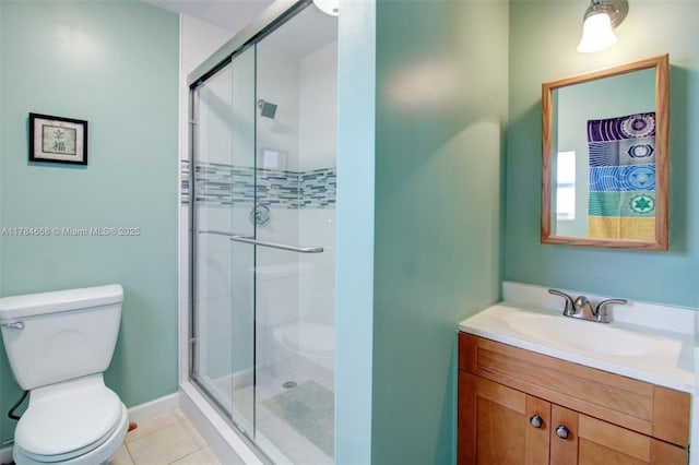 14875 SW 238th St, Homestead, FL 33032 - full bathroom featuring toilet, a shower stall, tile patterned floors, and vanity