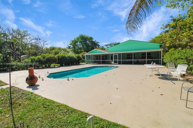 14875 SW 238th St, Homestead, FL 33032 - outdoor pool with a patio area and a sunroom