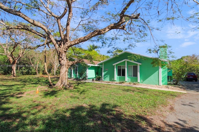 14875 SW 238th St, Homestead, FL 33032 - view of front of house with a front lawn