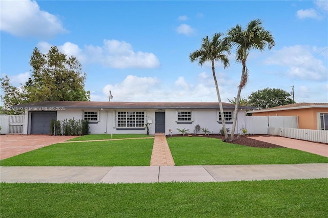 6051 SW 110th Ave, Miami, FL 33173 - ranch-style home with fence, an attached garage, concrete driveway, and a front lawn