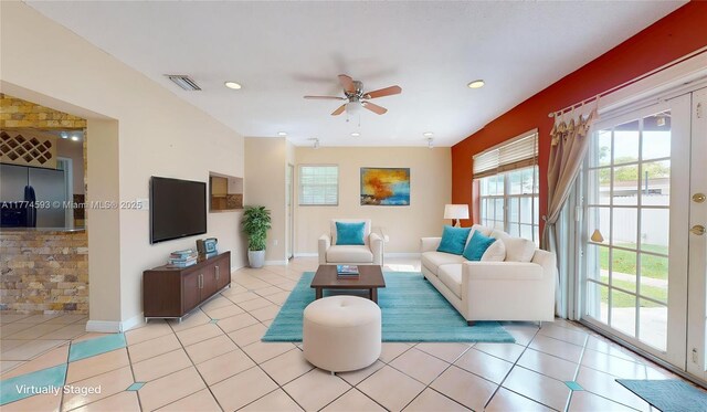 6051 SW 110th Ave, Miami, FL 33173 - living area with a ceiling fan, baseboards, visible vents, and light tile patterned floors