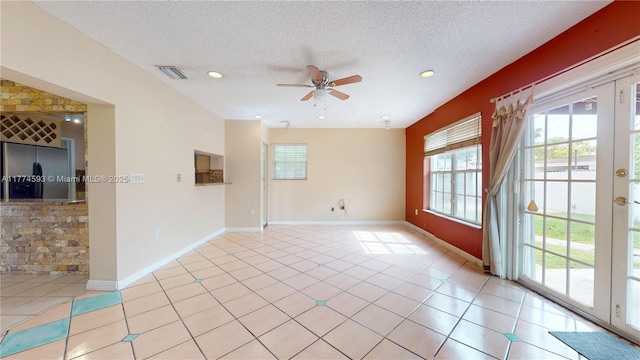 6051 SW 110th Ave, Miami, FL 33173 - empty room featuring light tile patterned floors, a ceiling fan, a textured ceiling, and visible vents