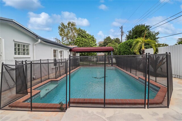 6051 SW 110th Ave, Miami, FL 33173 - view of pool with a fenced in pool and a fenced backyard