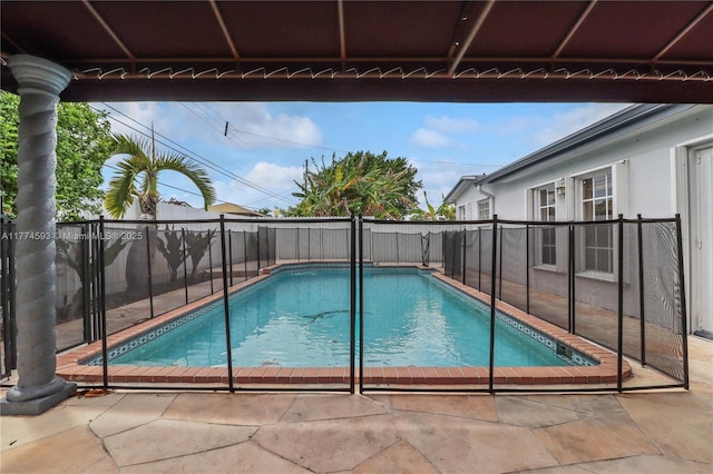 6051 SW 110th Ave, Miami, FL 33173 - view of swimming pool with a fenced backyard, a fenced in pool, and a patio