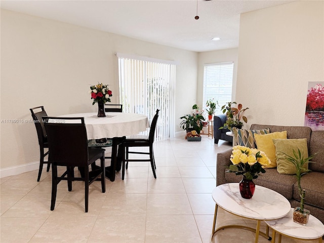 805 Riverside Dr Unit 1111, Coral Springs, FL 33071 - dining space with light tile patterned flooring and baseboards