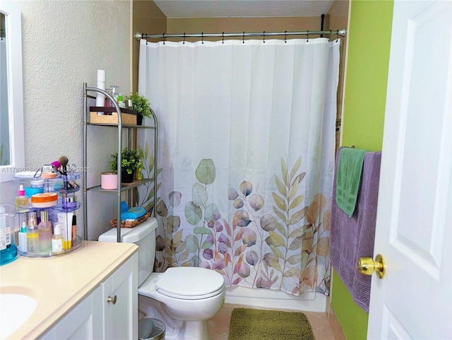 805 Riverside Dr Unit 1111, Coral Springs, FL 33071 - bathroom featuring a textured wall, toilet, vanity, and tile patterned floors
