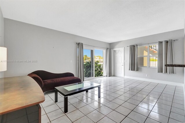 2200 S Ocean Dr Unit N116, Hollywood, FL 33019 - living room with baseboards and light tile patterned floors