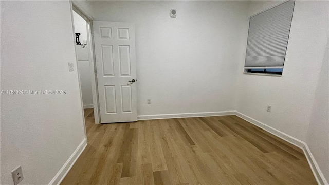 10620 NW 88th St Unit 205, Doral, FL 33178 - unfurnished room featuring light wood finished floors and baseboards