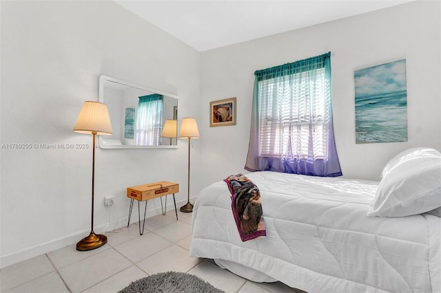 tiled bedroom with baseboards