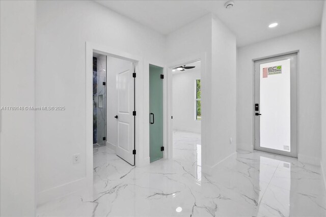 924 Berg St E, Lehigh Acres, FL 33974 - hallway featuring recessed lighting, marble finish floor, and baseboards