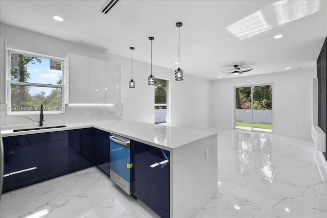 924 Berg St E, Lehigh Acres, FL 33974 - kitchen featuring a sink, recessed lighting, modern cabinets, and blue cabinets
