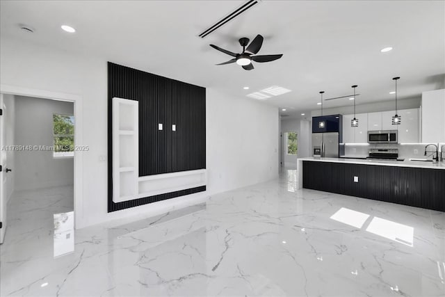 924 Berg St E, Lehigh Acres, FL 33974 - unfurnished living room featuring a sink, visible vents, ceiling fan, recessed lighting, and marble finish floor